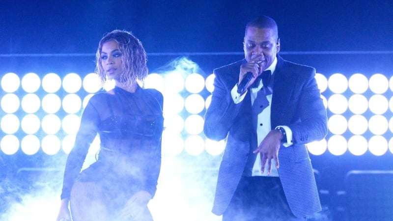 Beyonce and her husband Jay Z perform onstage during the 56th Grammy awards at Staples Centre in Los Angeles. Photograph: Kevork Djansezian/Getty Images