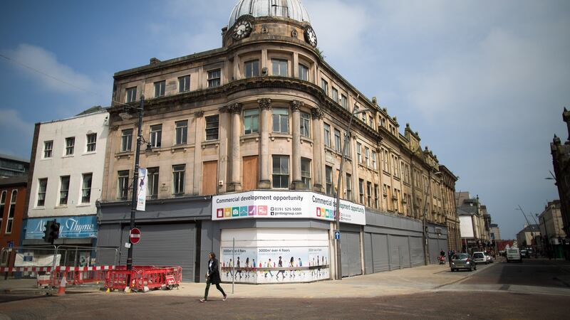 A pedestrian walks past shuttered shops on a high street in Sunderland. The city was a bellwether for how much people want to leave the world’s largest trading bloc rather than embrace it. Photograph: Simon Dawson/Bloomberg via Getty Images