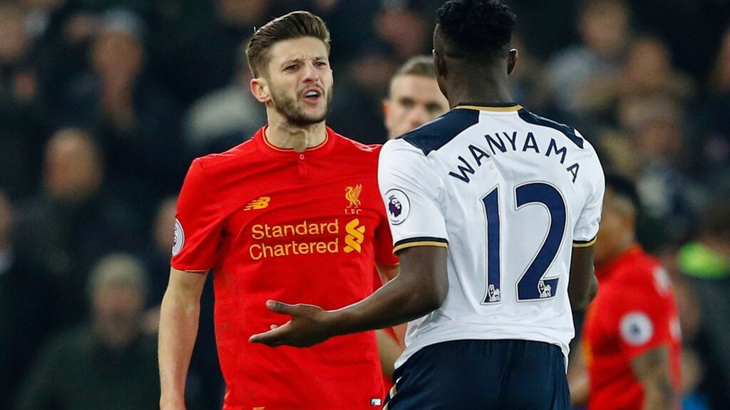 Liverpool’s Adam Lallana clashed with Tottenham’s Victor Wanyama at Anfield. Photograph: Phil Noble/Reuters