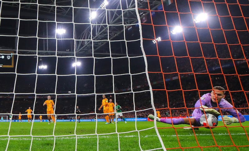 Netherlands' goalkeeper Bart Verbruggen fails to stop a shot by Adam Idah from crossing the line in Amsteram on Saturday. Unfortunately for Ireland, Idah has been offside before shooting. Photograph: Ryan Byrne/Inpho