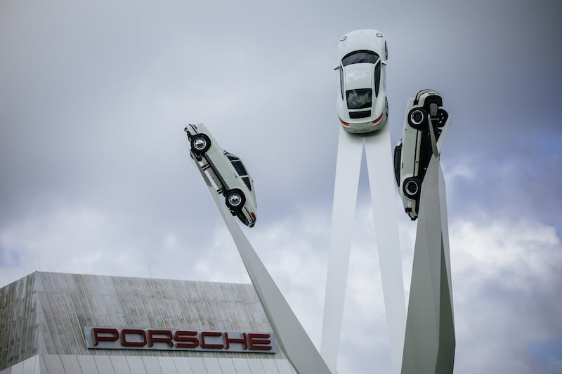 A sculpture stands in front of Porsche's corporate headquarters in Stuttgart. Photograph: Thomas Niedermueller/Getty Images