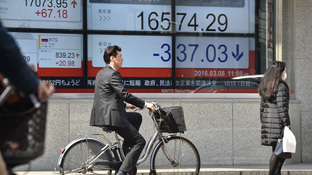 Tokyo shares fell sharply on Tuesday morning as a stronger yen hit exporters, while investors awaited the release of key Chinese trade data. (Photograph: AZUHIRO NOGIKAZUHIRO NOGI/AFP/Getty Images)