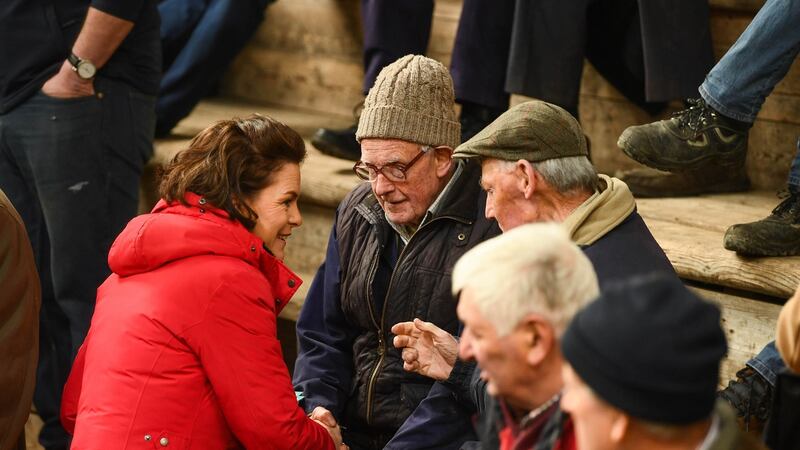 Fine Gael general election candidate Mary Newman Julian with Nicholas Morrissey from Ballycahill and Joe Molloy from Holycross at the Mid Tipperary Co-Operative Livestock Mart in Thurles, Co Tipperary. Photograph: Diarmuid Greene