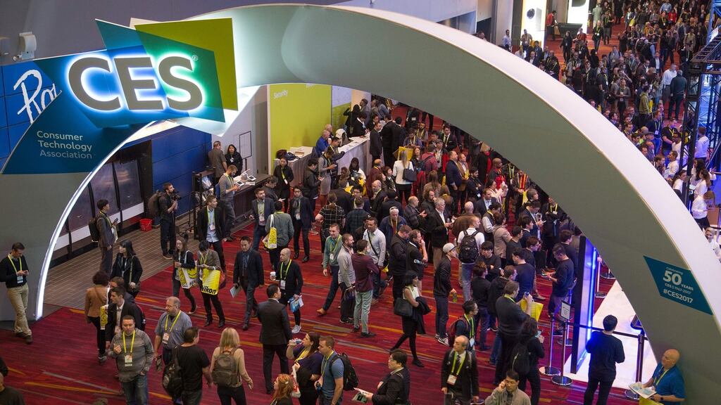 Delegates arrive for the opening day of Consumer Electronics Show in Las Vegas on Thursday. Photograph: AFP