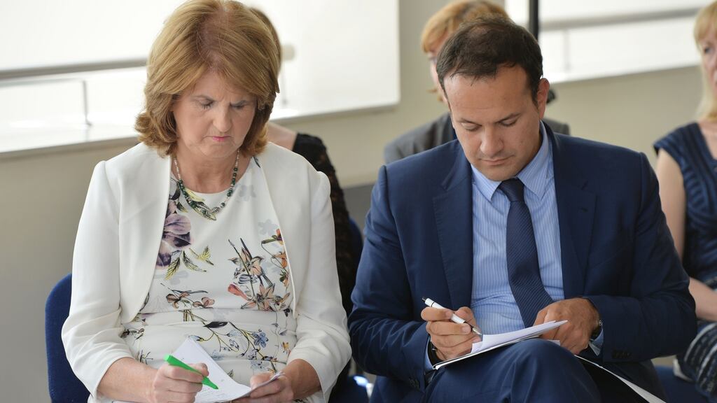 Former tánaiste Joan Burton and  Minister for Social Protection Leo Varadkar were accused of playing politics before the general election over a school in their Dublin West constituency. File photograph: Alan Betson/The Irish Times