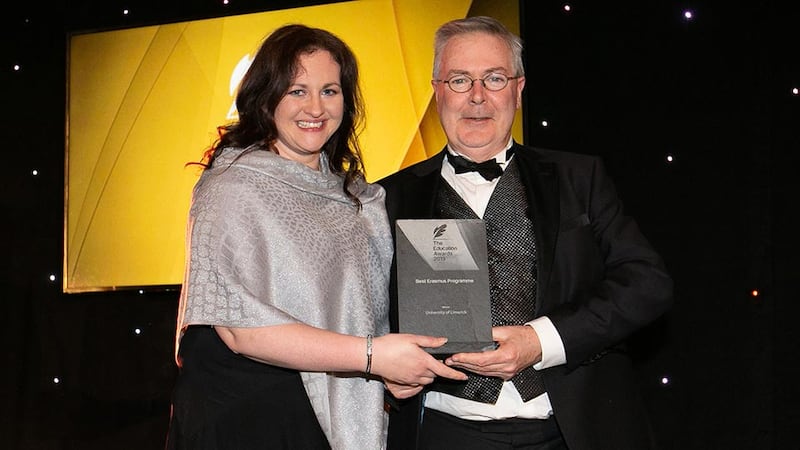 Prof. Louis Brennan, Trinity Business School presents the Best Erasmus Programme award to Madeline Molyneaux, University of Limerick.