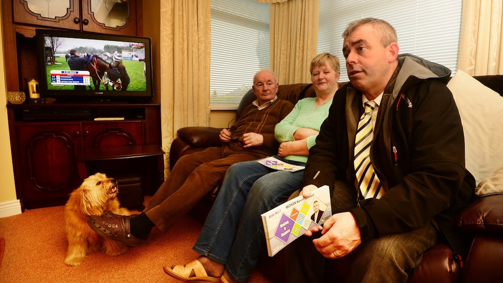Cllr Kevin ‘Boxer’ Moran canvassing Maura and Billy Golden, with their dog Rosie, in the Coosan area of Athlone. Photograph: Cyril Byrne