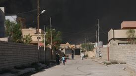 Retreating Isis fighters leave dark pall in their wake in Iraq