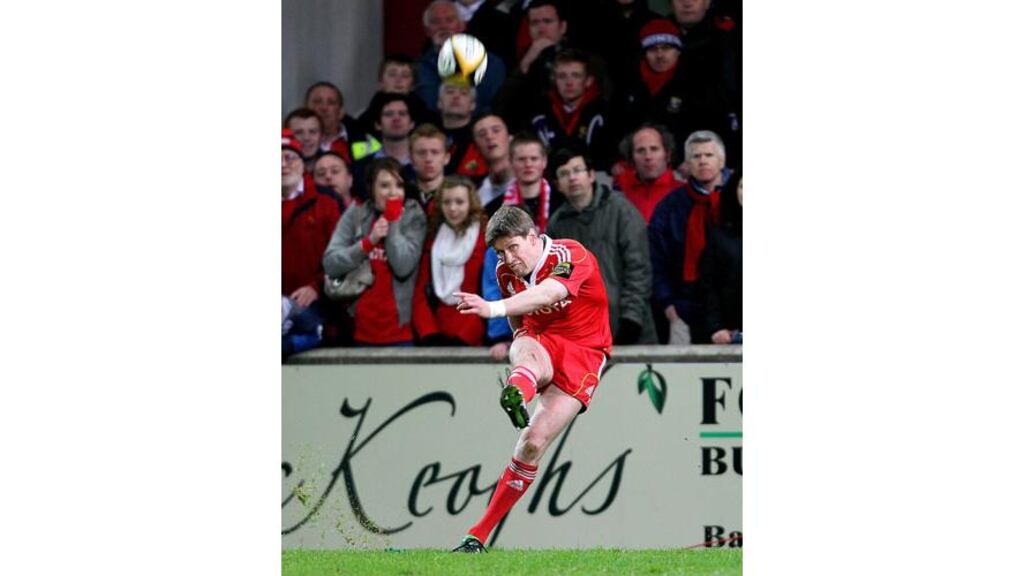 Cometh the hour...Munster hero Ronan O'Gara kicks the winning penalty in the dying seconds of a high octane Magners League encounter against provincial rivals Leinster at Thomond Park. Photograph: Lorraine O'Sullivan/Inpho