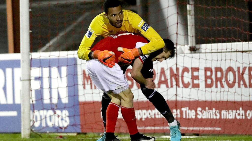 St Patricks Athletic’s Jake Keegan and Lawrence Vigoroux of Waterford collide. Photograph: Inpho