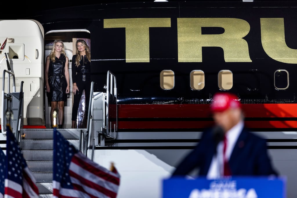 Two women watch former US president Donald Trump at a rally for Republican Senate candidate from Pennsylvania, Mehmet Oz. Photograph: Jim Lo Scalzo/EPA
