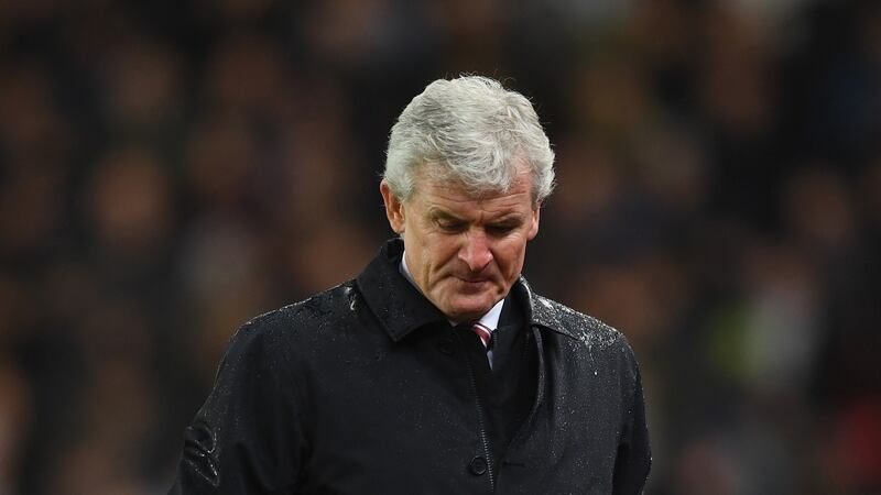Mark Hughes saw his Stoke side beaten 1-0 by Newcastle. Photograph: Gareth Copley/Getty