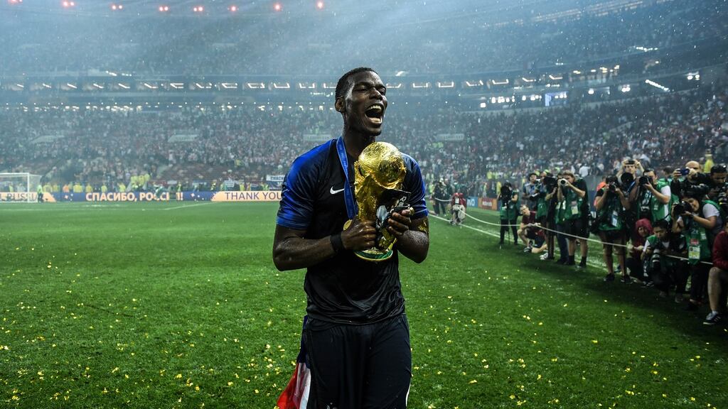 Paul Pogba with the World Cup trophy in 2018. Photo: David Ramos/Fifa/Getty Images