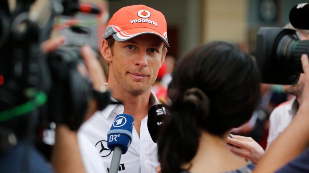 McLaren driver Jenson Button speaks to the media on Thursday ahead of Sunday’s Bahrain Grand Prix at the Sakhir circuit in Manama. Photograph: Reuters/Darren Whiteside