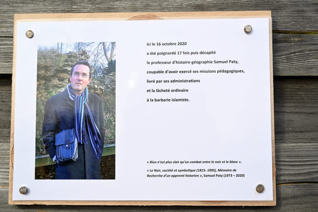 A commemorative plaque for slain teacher Samuel Paty near the Bois d'Aulne school outside Paris. Photograph: Getty