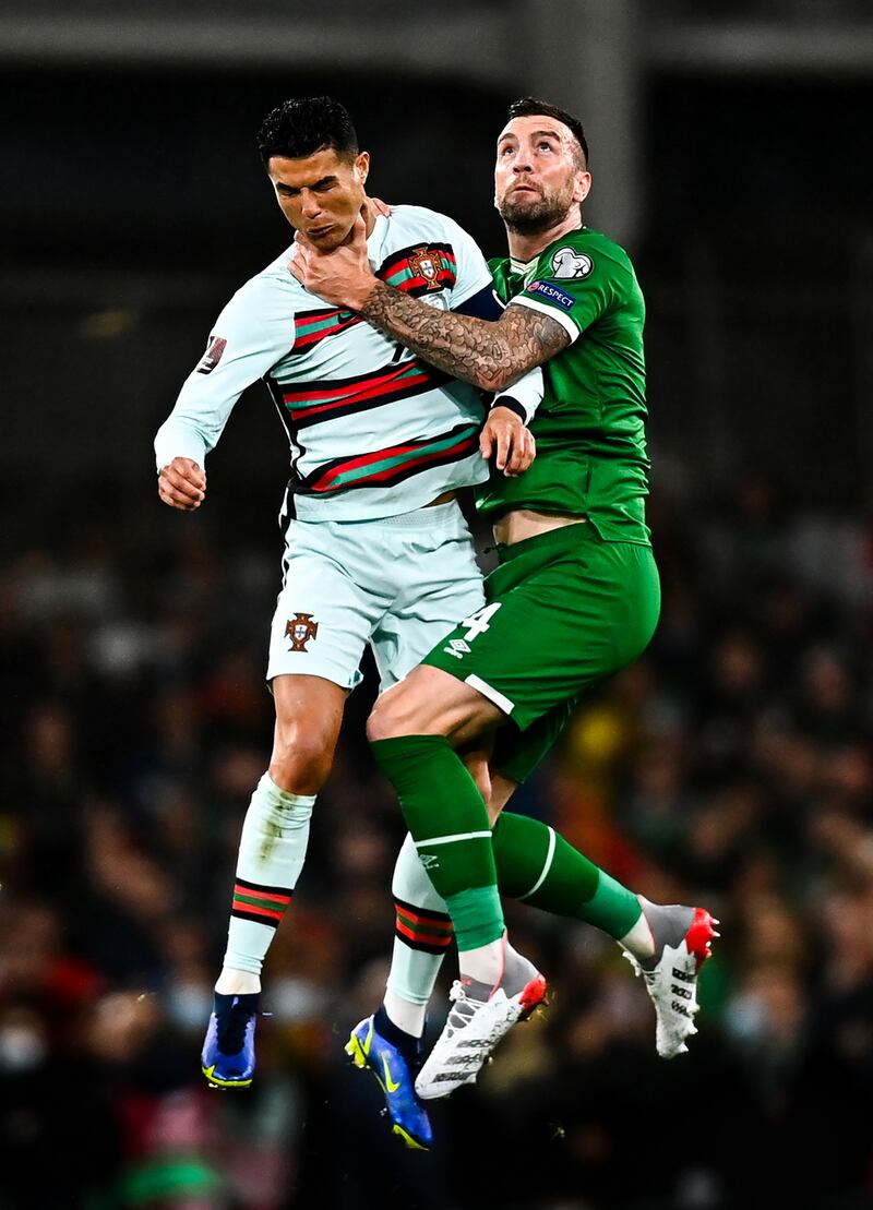 Sports Action 1st – Ireland’s Shane Duffy gets up close and personal with Portugal’s Ronaldo at the Aviva Stadium in Dublin. Photograph: Eoin Noonan