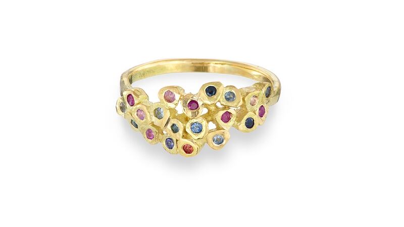 An 18ct gold Mosaic gold ring with sapphires, €1,950, from AMOC Jewellery.
