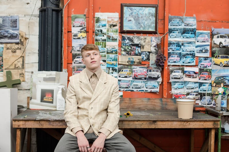 Nude high-collar shirt €4, Age Action, Camden Street, Dublin 8; ivory check suit jacket €6, Dublin Vintage, Capel Street, Dublin 1; grey suit trousers €10, Oxfam, South Great George’s Street, Dublin 2