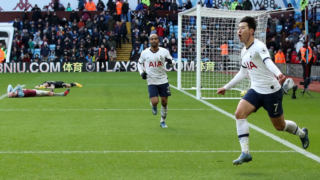 Heung-Min Son of Tottenham Hotspur celebrates with team mates after scoring the winner during their Premier Keague clash with Aston Villa. Photo: Nick Potts/PA Wire