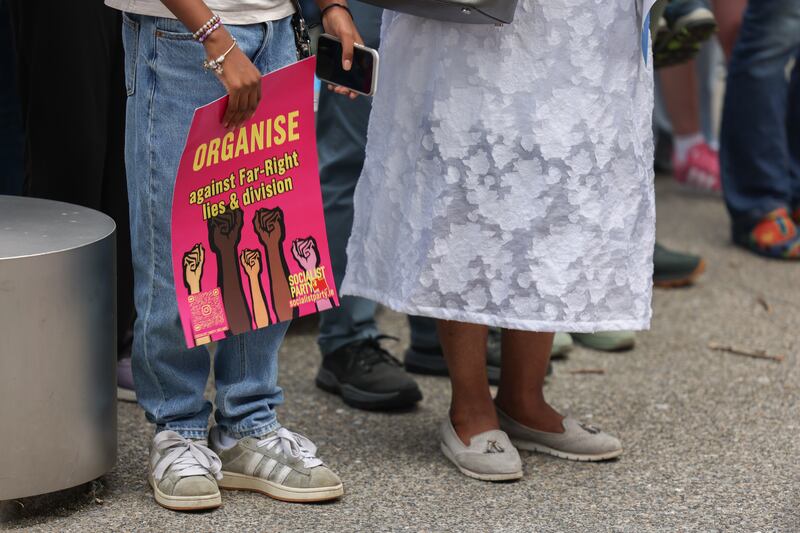 A mother and daughter attend the protest in Tallaght