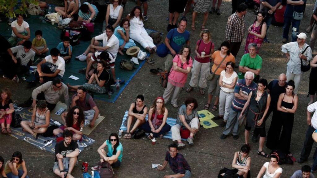 Supporters of the employees of Greek state broadcaster ERT attend a concert outside its headquarters in Athens yesterday. Greek prime minister Antonis Samaras yesterday dismissed talk of an early election over the abrupt closure of the state broadcaster. Photograph: Reuters/Yorgos Karahalis