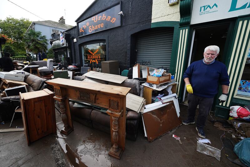 The clean up got under way in Midleton after extensive damage caused by flooding following Storm Babet. Photograph: Brian Lawless/PA Wire