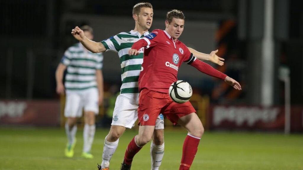Shamrock Rovers’ Shane Robinson challenges Sligo Rovers’ Danny Ventre at Tallaght. Photo: Morgan Treacy/Inpho