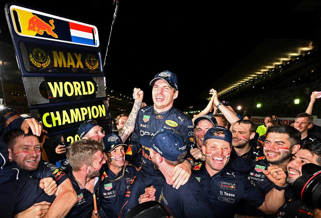 Max Verstappen and his Red Bull team celebrate his title victory after winning the Japanese Grand Prix at Suzuka. Photograph: Clive Mason/Getty Images