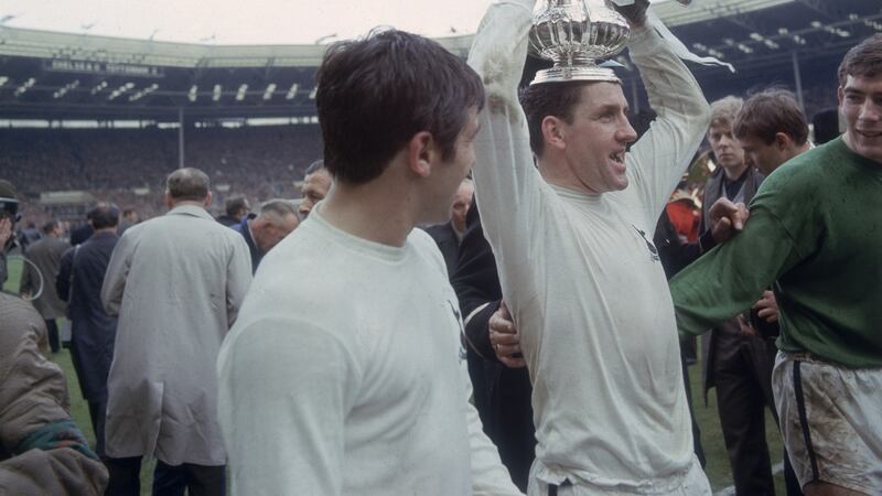 Dave Mackay lifts the FA Cup on his head as he celebrates Spurs’ 2-1 win over Chelsea. “I have a recollection of watching the 1967 final on telly. Black and white. Chelsea were playing Spurs and I decided I was up for Chelsea. They lost but it didn’t matter. That was it, for life.” Photograph: George Freston/Fox Photos/Getty Images