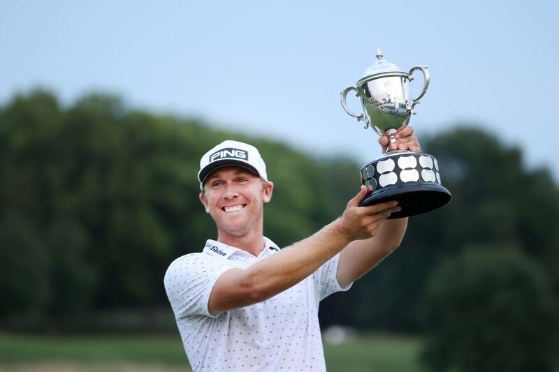 Seamus Power lifts the trophy after his breakthrough win at the Barbasol Championship at Keene Trace Golf Club in July 2021 in Nicholasville, Kentucky. Photograph: Andy Lyons/Getty Images