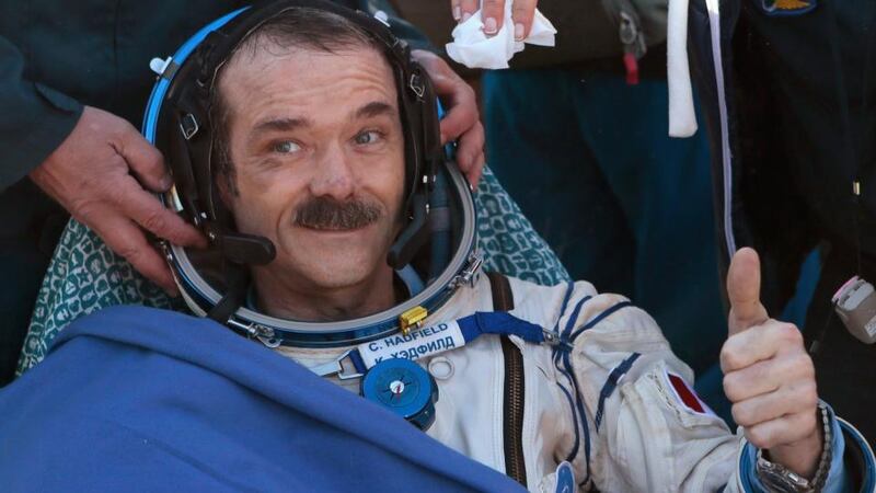 Chris Hadfield gives  a thumbs up after the Russian Soyuz space capsule landed in central Kazakhstan last May, bringing to an end his time in space. Photograph: Mikhail Metzel/Reuters