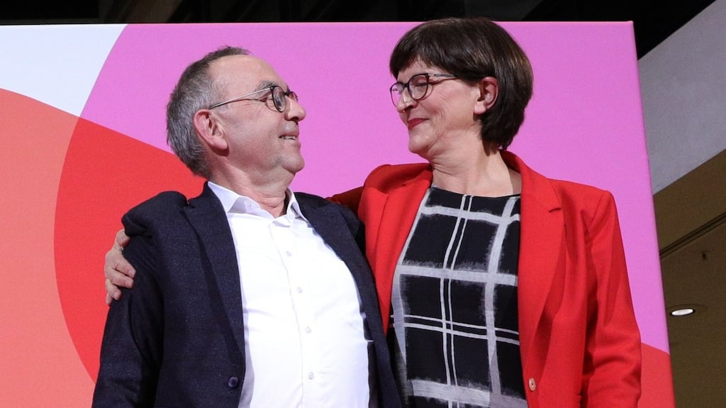 Norbert Walter-Borjans and Saskia Esken celebrate at the SPD’s headquarters in Berlin after they were elected co-leaders of the party. Photograph: Omer Messinger/EPA