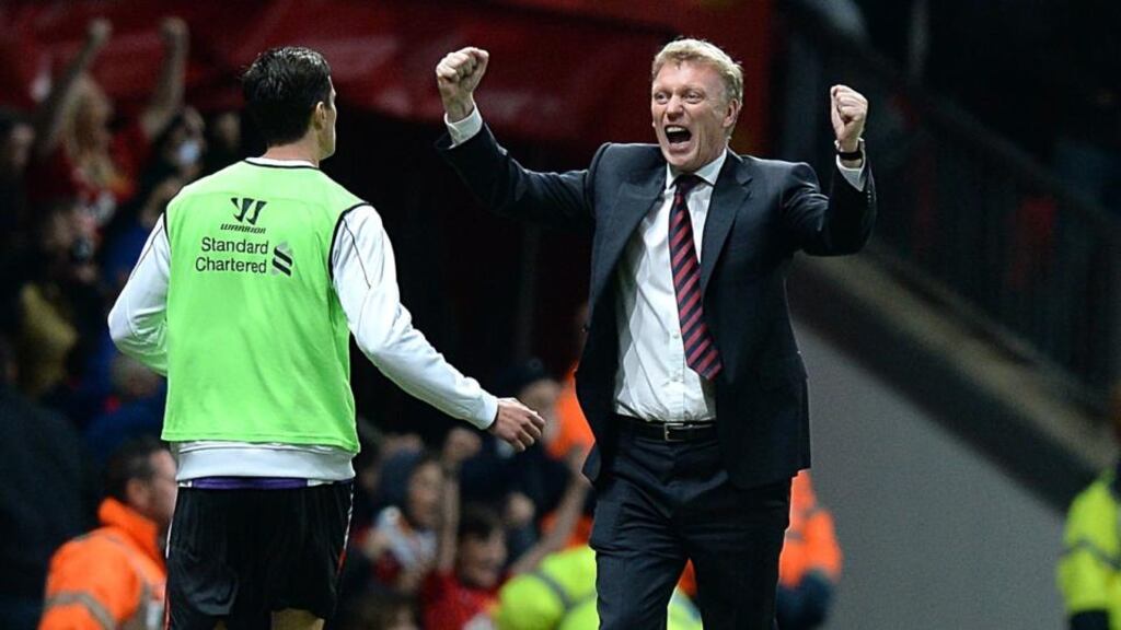 Manchester United manager David Moyes celebrates after Javier Hernandez goal against Liverpool at Old Trafford. Photograph: Martin Rickett/PA Wire