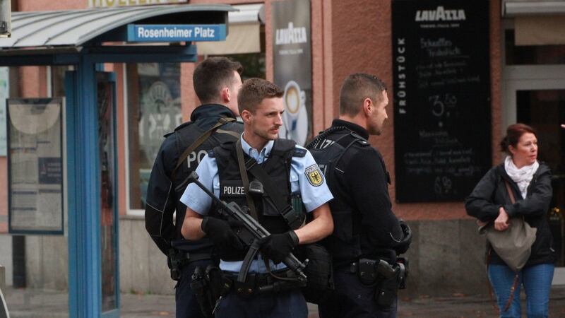 German police officers at the crime scene where a man injured several people. Photograph: EPA