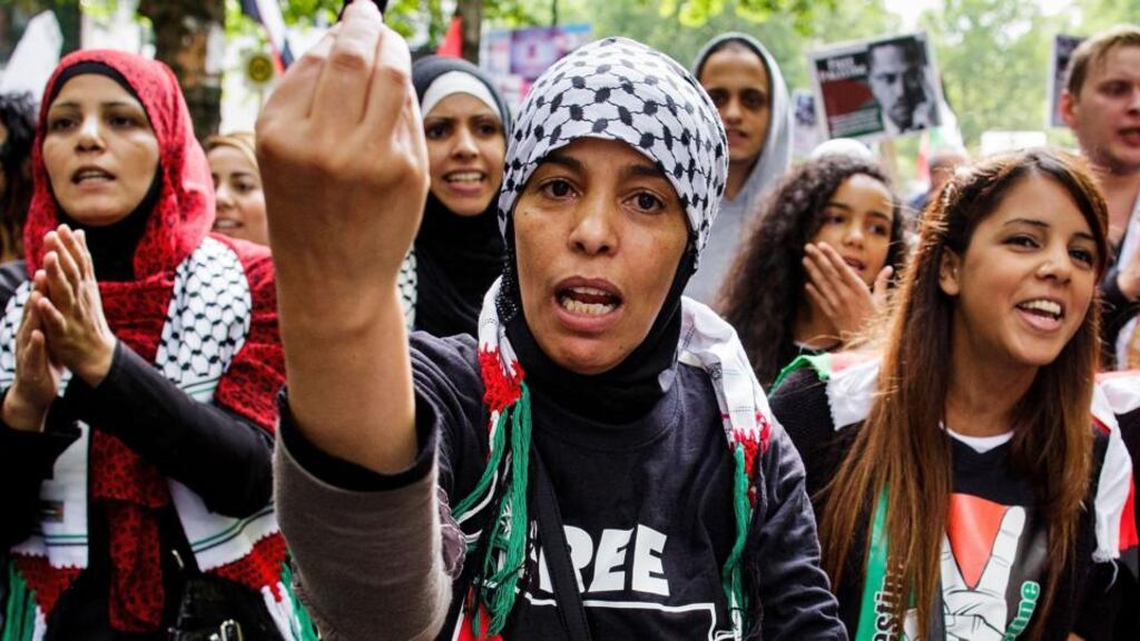 Demonstrators at a rally for Al-Quds Day, an event intended to express solidarity with the Palestinian people, in Berlin yesterday. Photograph: Carsten Koall/Getty Images