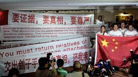 Relatives of MH370 passengers protest in Malaysia