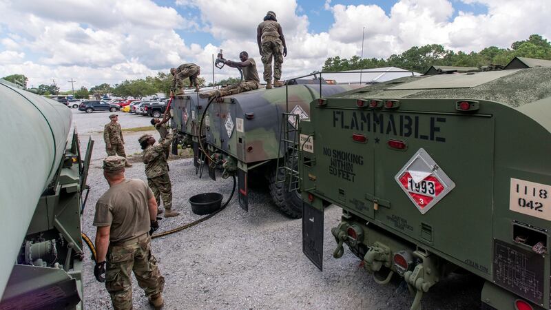South Carolina National Guard soldiers transfer bulk diesel fuel into fuel tanker trucks for distribution in advance of Hurricane Florence, in North Charleston, South Carolina. Photograph: Sgt Brian Calhoun/Reuters