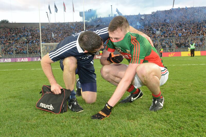Stephen Cluxton consoles Mayo's Diarmuid O'Connor after the 2016 All-Ireland final. Photograph: Cyril Byrne