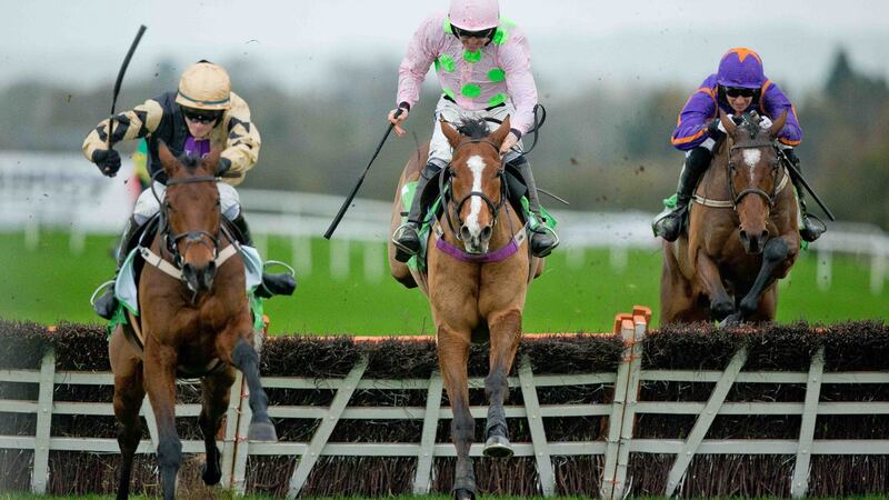 Punchestown Racing, Morgiana Hurdle, November 2015: David Mullins on Nichols Canyon clears the last ahead of Ruby Walsh on Faugheen and Paddy Mullins on Wicklow Brave to win the race. Photograph: Morgan Treacy/©INPHO