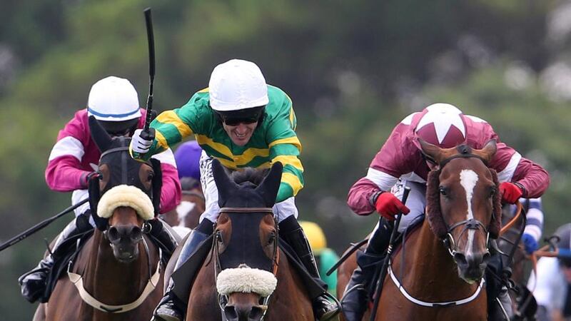Tony McCoy onboard Thomas Edison on his way to winning The Guinness Galway Hurdle. Photograph: Cathal Noonan/Inpho