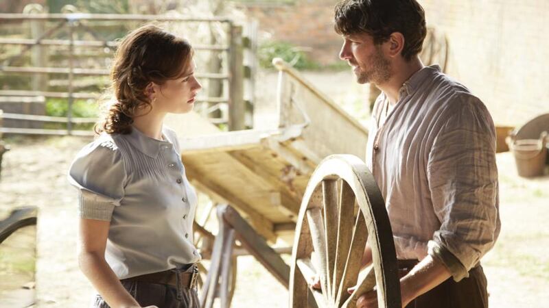 Lily James and Michiel Huisman in ‘The Guernsey Literary and Potato Peel Pie Society’ (2018). Photograph: StudioCanal
