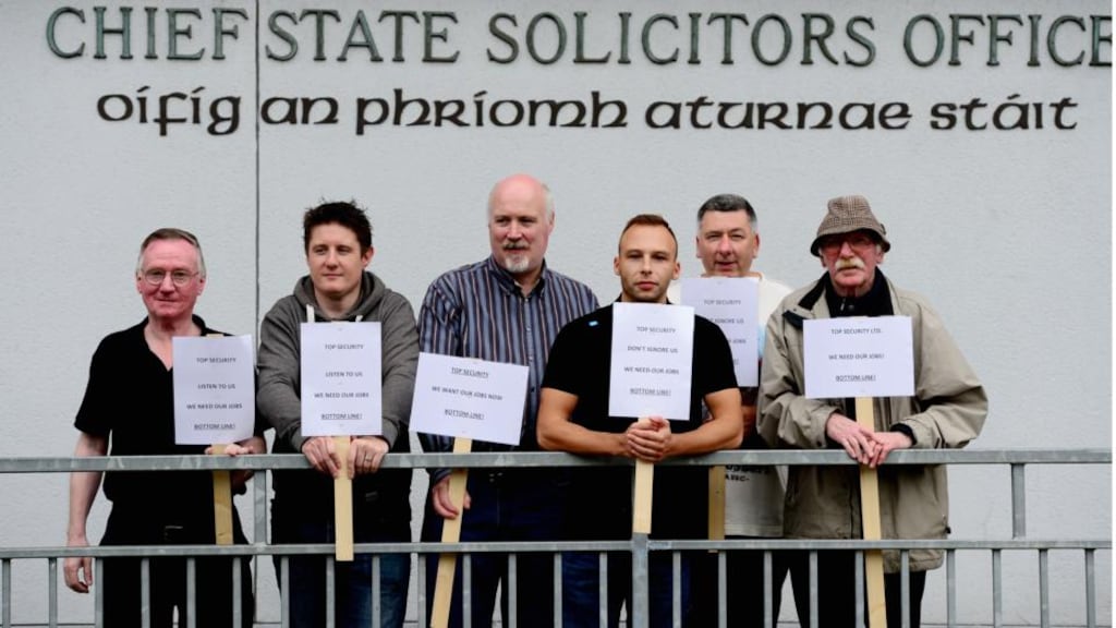 Members of Siptu who were recently employed as security officers at the Chief State Solicitor’s Office protesting there yesterday. Photograph: Bryan O’Brien/ The Irish Times