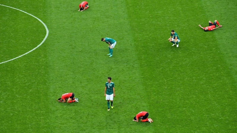 South Korea players celebrate their 2-0 victory over world champions Germany. Photograph: Dylan Martinez/Reuters