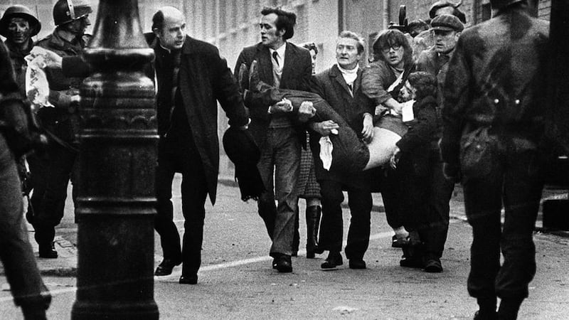 Fr Edward Daly waves a white handkerchief to aid a victim of Bloody Sunday, January 30th, 1972.