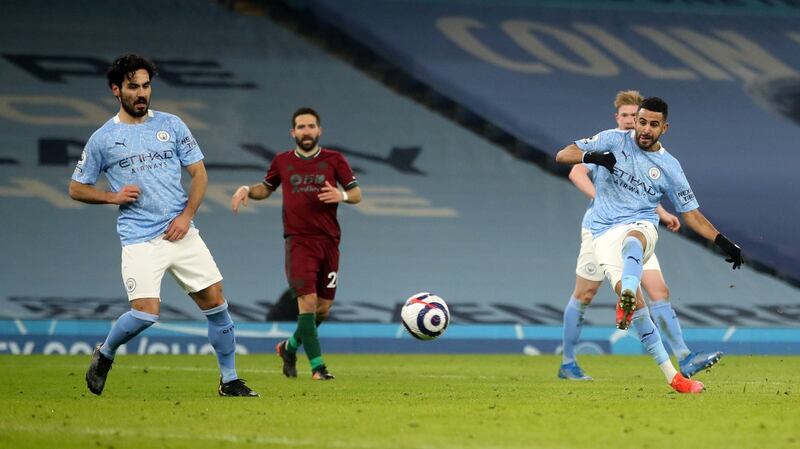 Manchester City’s Riyad Mahrez scores their third goal during the Premier League match against Wolves at the Etihad Stadium. Photograph: Carl Recine/PA Wire