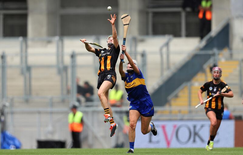 Kilkenny Laura Murphy goes for a high ball challenged by Tipperary's Caoimhe McCarthy. Photograph: Leah Scholes/Inpho