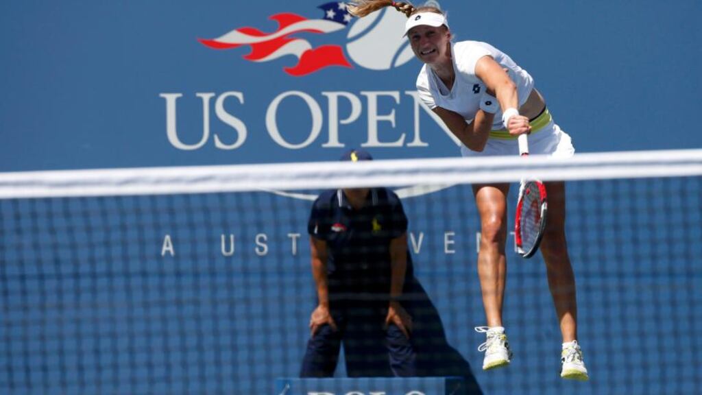 Ekaterina Makarova of Russia serves to Victoria Azarenka of Belarus during their US Open quarter-final match in New York. Photograph: Mike Segar/Reuters