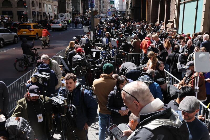 Media and members of the public gather outside Trump Tower awaiting the arrival of former US president Donald Trump. Photograph: Scott Olson/Getty Images