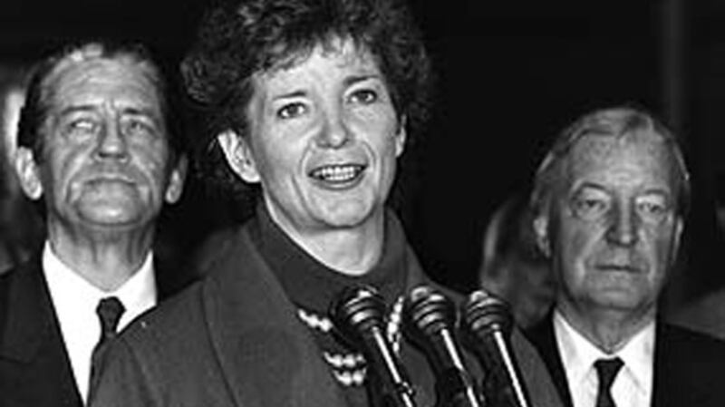 Defeated presidential candidate Brian Lenihan, president-elect Mary Robinson and taoiseach Charles Haughey at the RDS, Dublin in November 1990. Photograph: National Library of Ireland