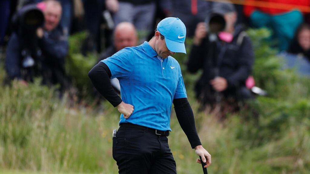 Rory McIlroy stands dejected during the first round of the British Open at Portrush. Photo: Paul Childs/Inpho